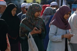 Muslim women wearing 'tudung' or headscarves shop in Kota Bharu